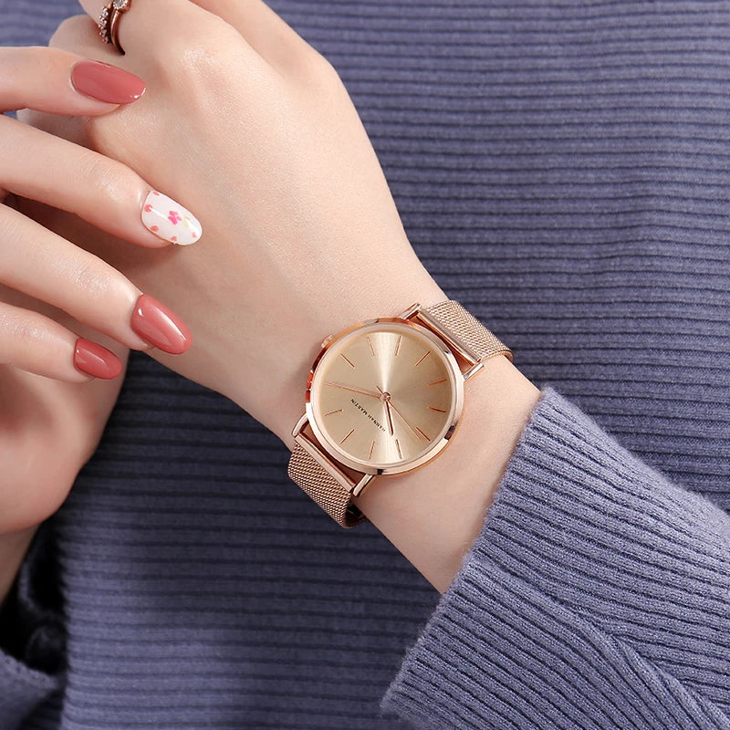Montre Hannah Martin, Simple et Étanche, Acier Inoxydable Doré Rose avec Bracelet Maille.