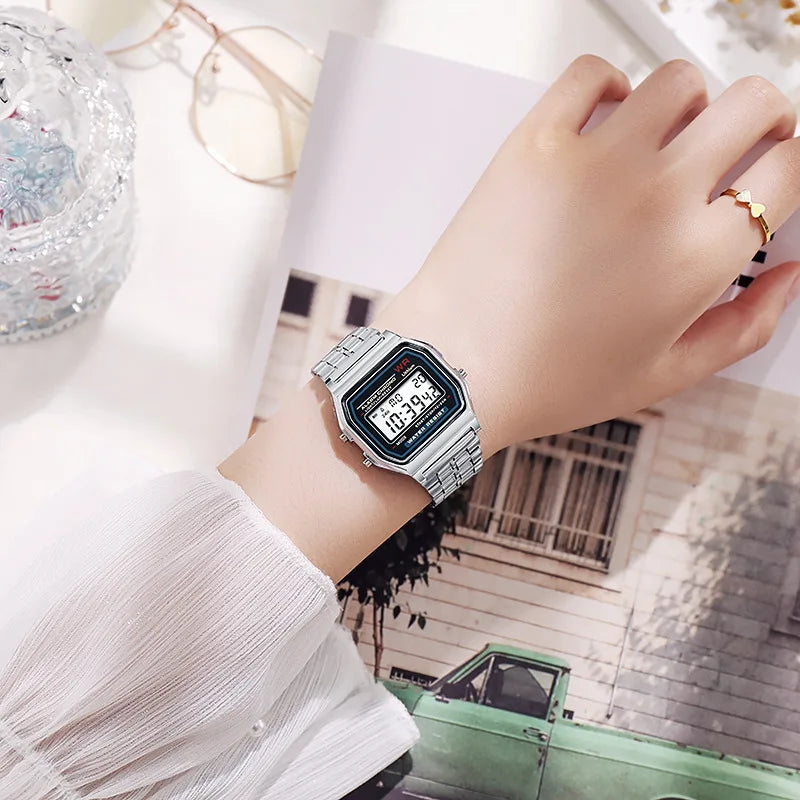 Montre unisexe de luxe en or rose, affichage numérique électronique, style rétro.