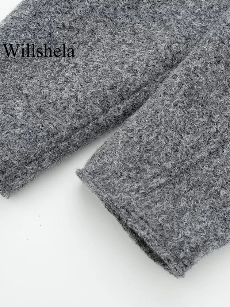 Veste grise avec poches, fermeture éclair sur le devant, col à revers vintage