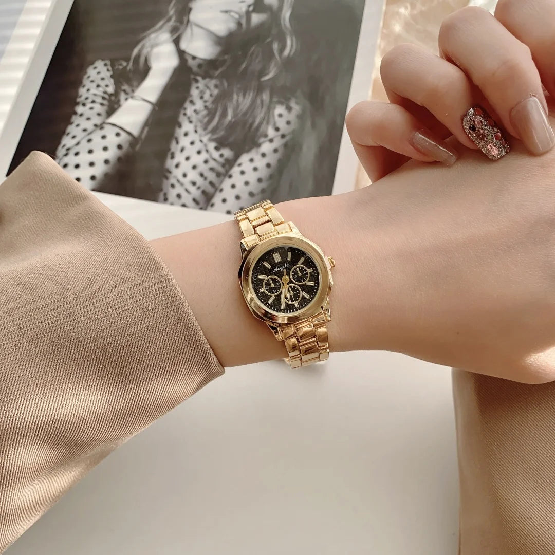 Montre-bracelet femme en acier doré à quartz, style luxe.